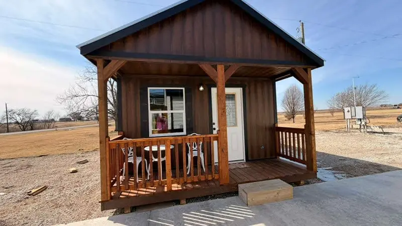 14x28 Tiny Home &ndash; Model 1219, front exterior with covered porch