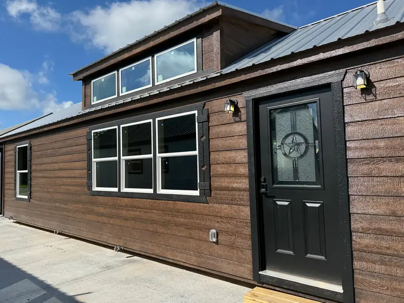 16x44 Tiny Home – Model 6928, front door with star glass