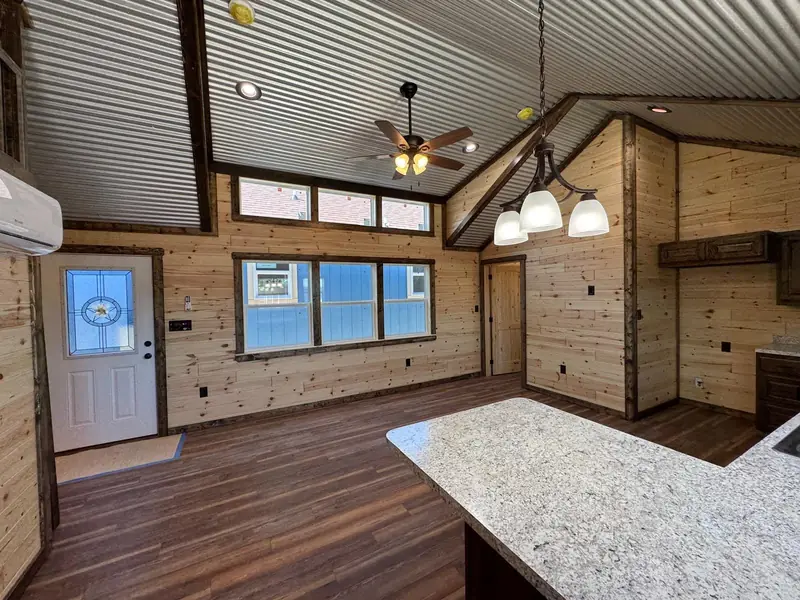 16x44 Tiny Home &ndash; Model 6928, great room with chandelier