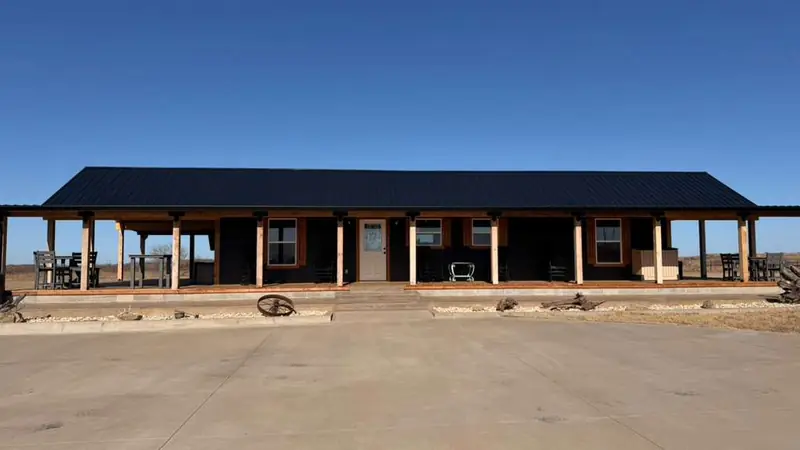 18x48 Tiny Home &ndash; Model 8068, front view with the optional wraparound porch