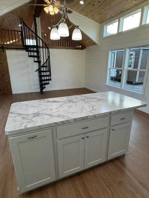 18x54 Tiny Home &ndash; Model 8530, kitchen island and spiral staircase
