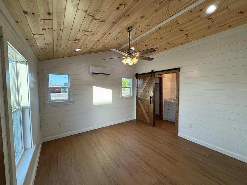 18x54 Tiny Home &ndash; Model 8530, room with a barn door